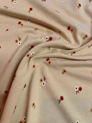 Baumwoll- Jersey mit kleinen Blumenmuster beige